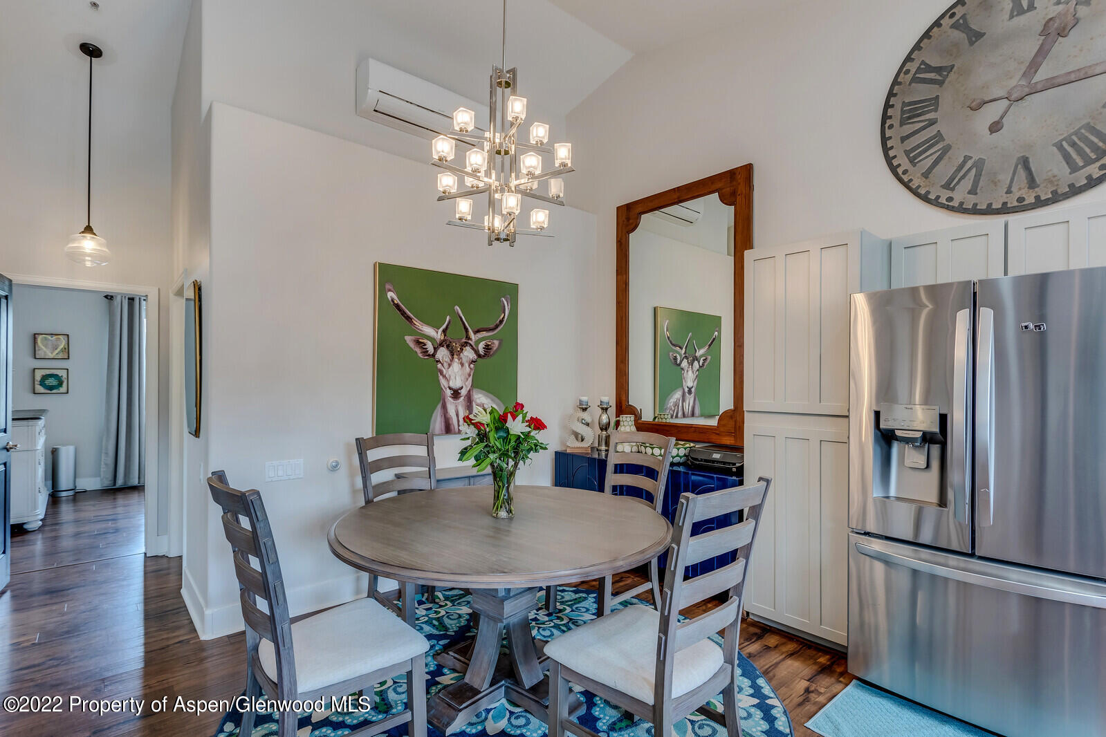 712 Evans Court Basalt, CO 81621 - Photo 13 of 29 a view of a dining room with furniture window and wooden floor