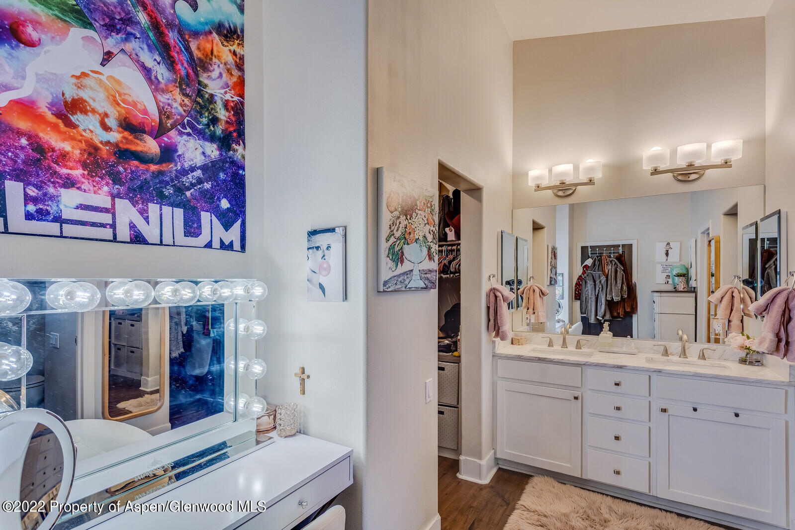 712 Evans Court Basalt, CO 81621 - Photo 16 of 29 a spacious bathroom with a double vanity sink and a mirror