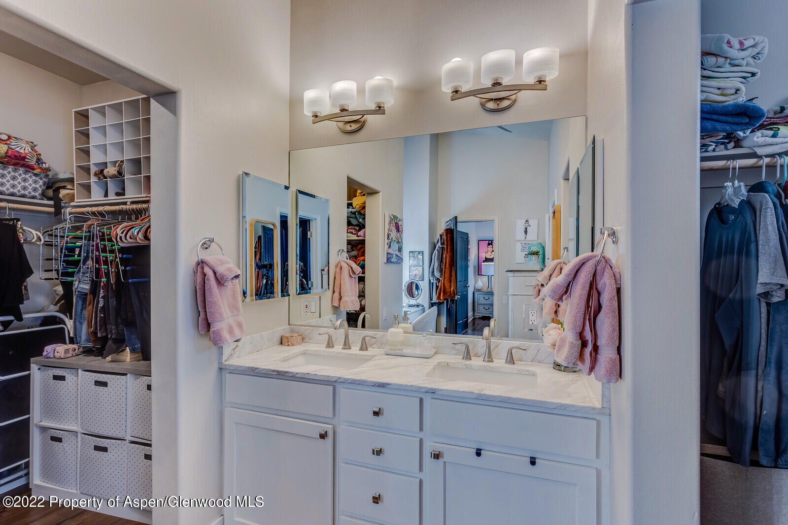 712 Evans Court Basalt, CO 81621 - Photo 17 of 29 a bathroom with a double vanity sink a mirror and shower