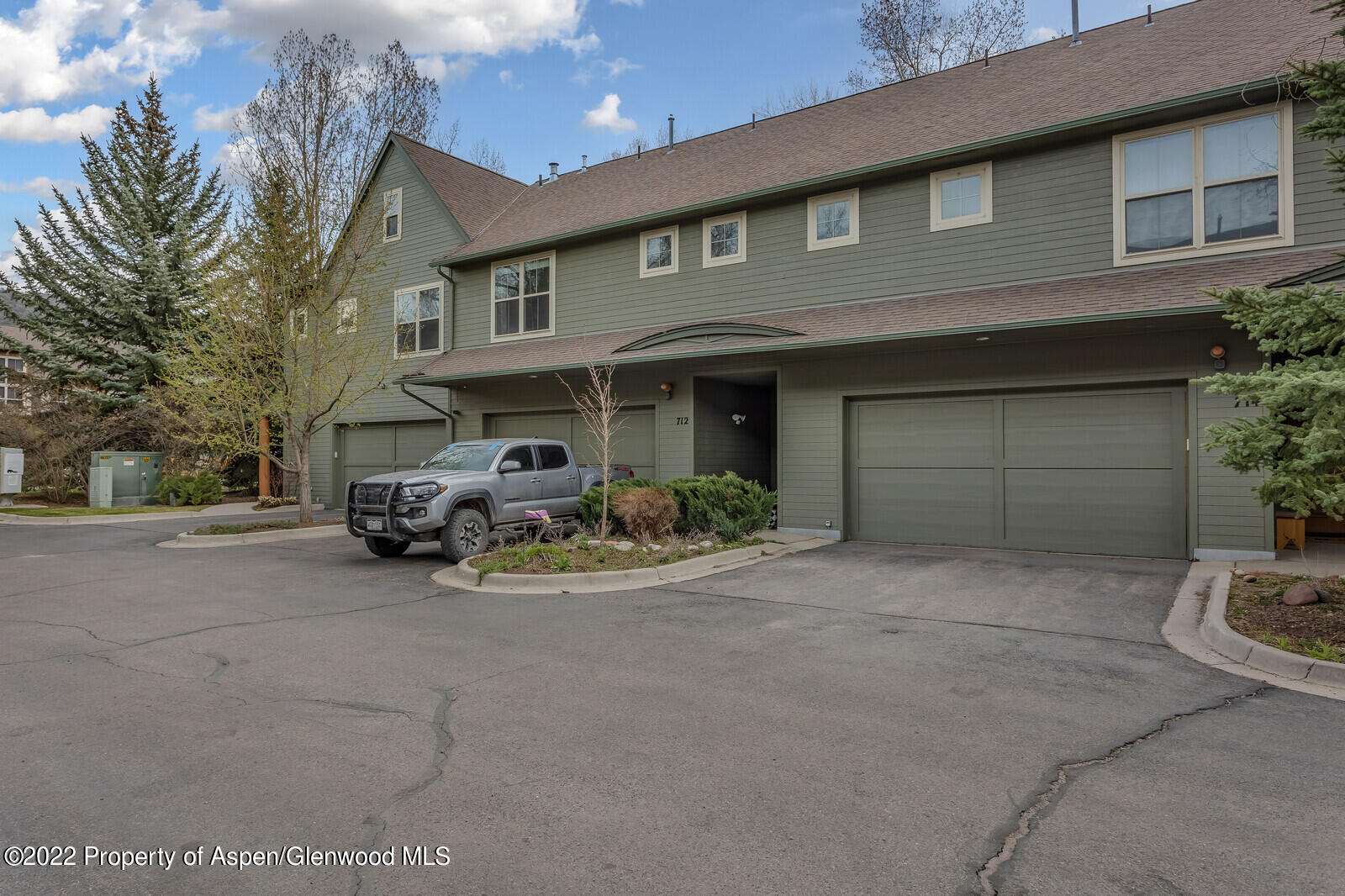 712 Evans Court Basalt, CO 81621 - Photo 2 of 29 a view of a house with large space and a car parked beside it