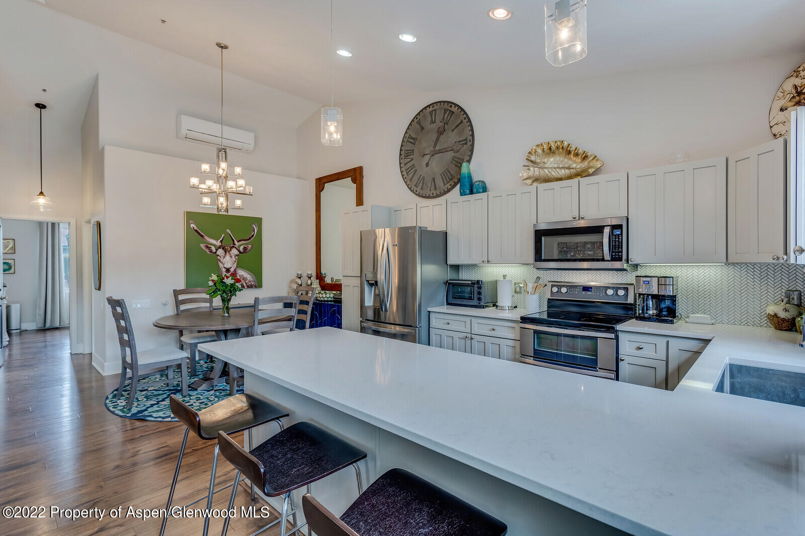 712 Evans Court Basalt, CO 81621 - Photo 24 of 29 a kitchen with a table and chairs in it
