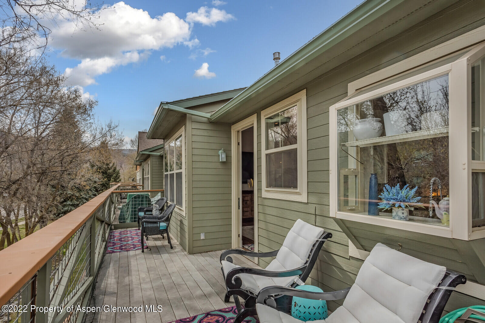 712 Evans Court Basalt, CO 81621 - Photo 29 of 29 a balcony with furniture and a potted plant