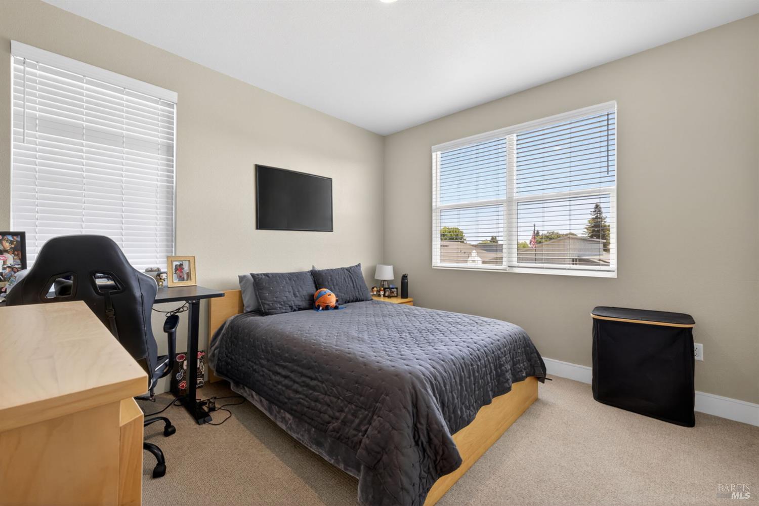 2215-2217 Versaro Drive Santa Rosa, CA 95403 - Photo 25 of 45 a bedroom with a bed and a window