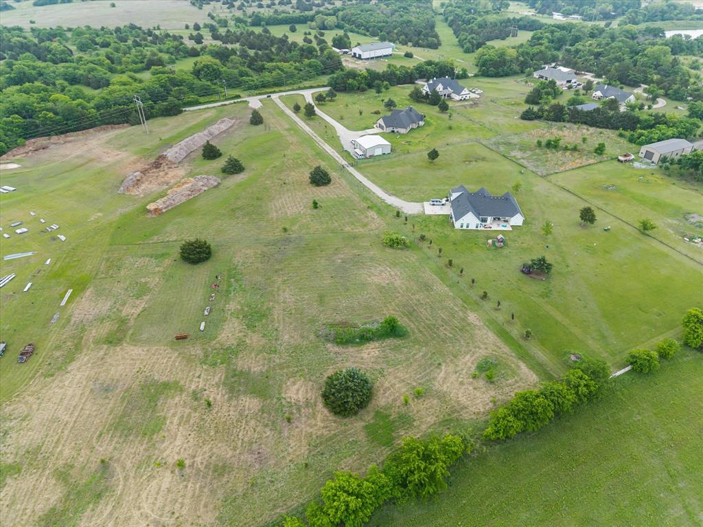 1259 Willy Vester Road Van Alstyne, TX 75495 - Photo 4 of 10 an aerial view of a residential houses with outdoor space and trees