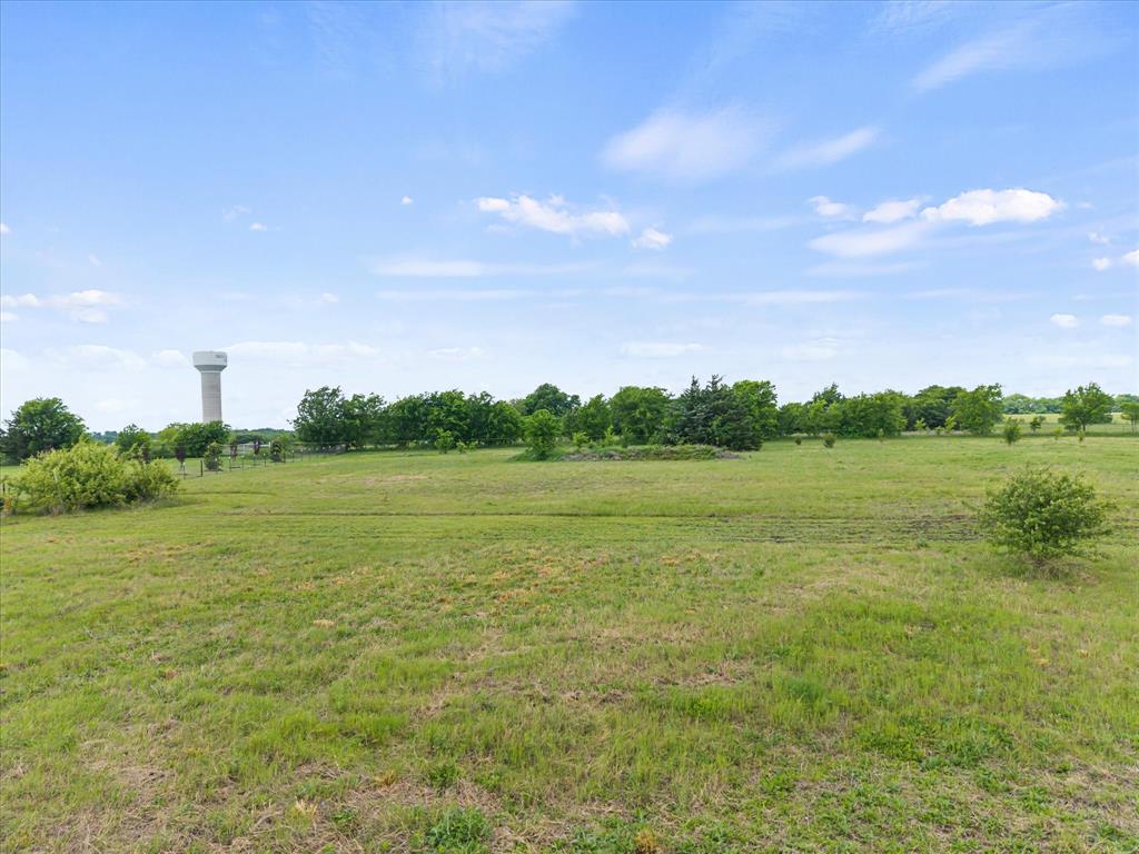 1259 Willy Vester Road Van Alstyne, TX 75495 - Photo 9 of 10 a view of a lake and mountain in the back