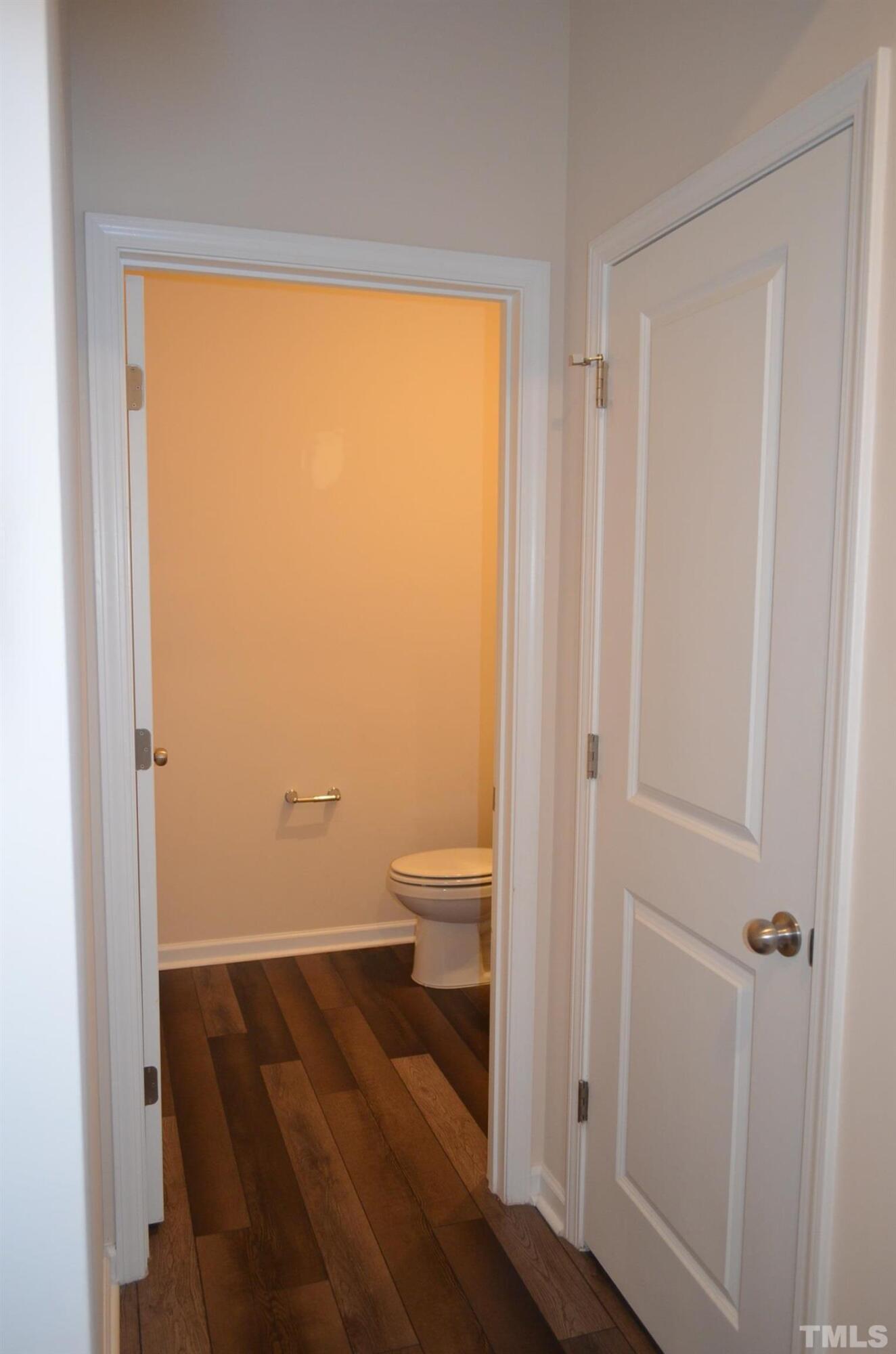 3537 Pinnacle Peak Drive Raleigh, NC 27604 - Photo 13 of 41 a bathroom view of a toilet and a shower