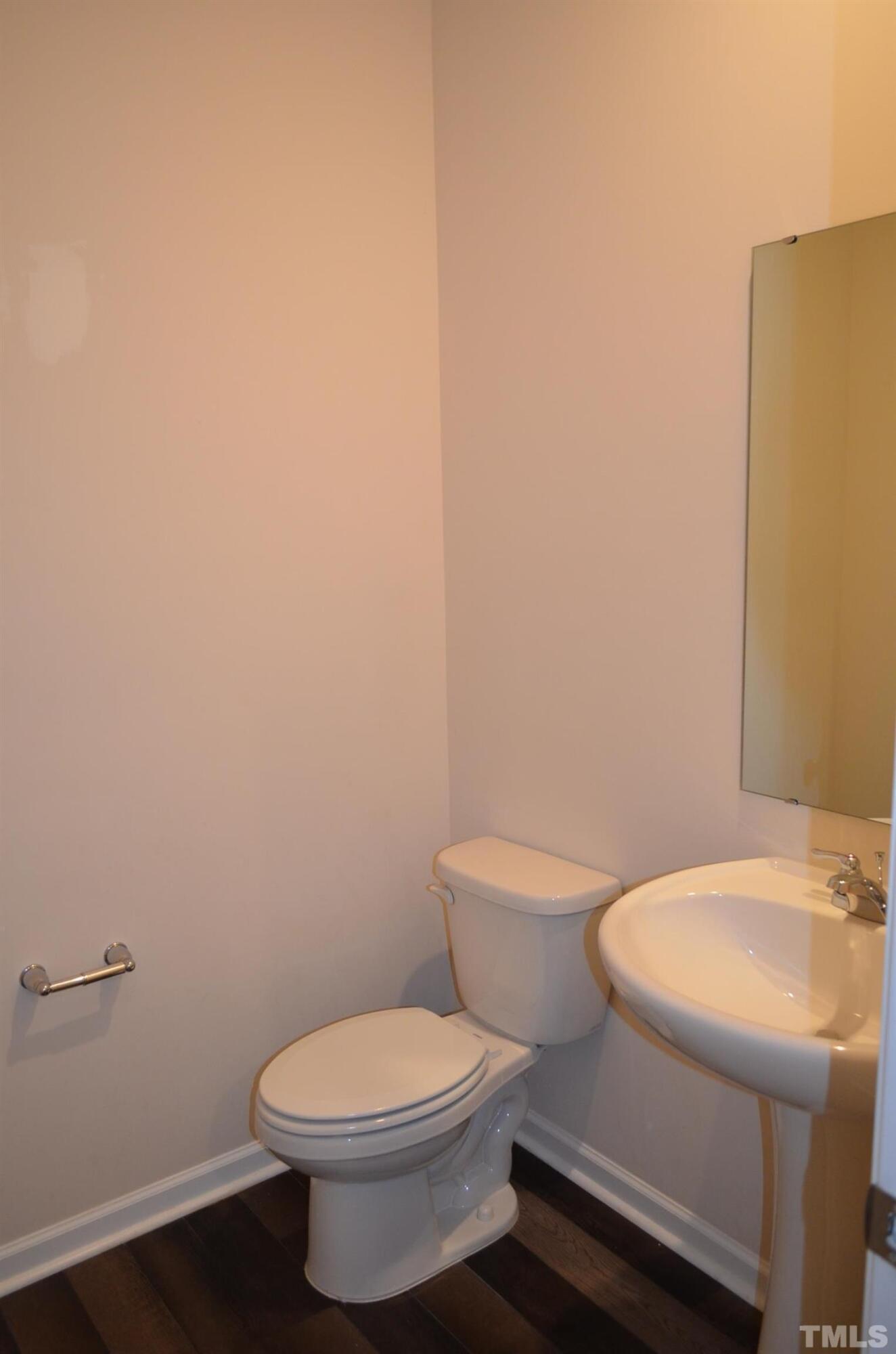 3537 Pinnacle Peak Drive Raleigh, NC 27604 - Photo 14 of 41 a white toilet sitting next to a white toilet