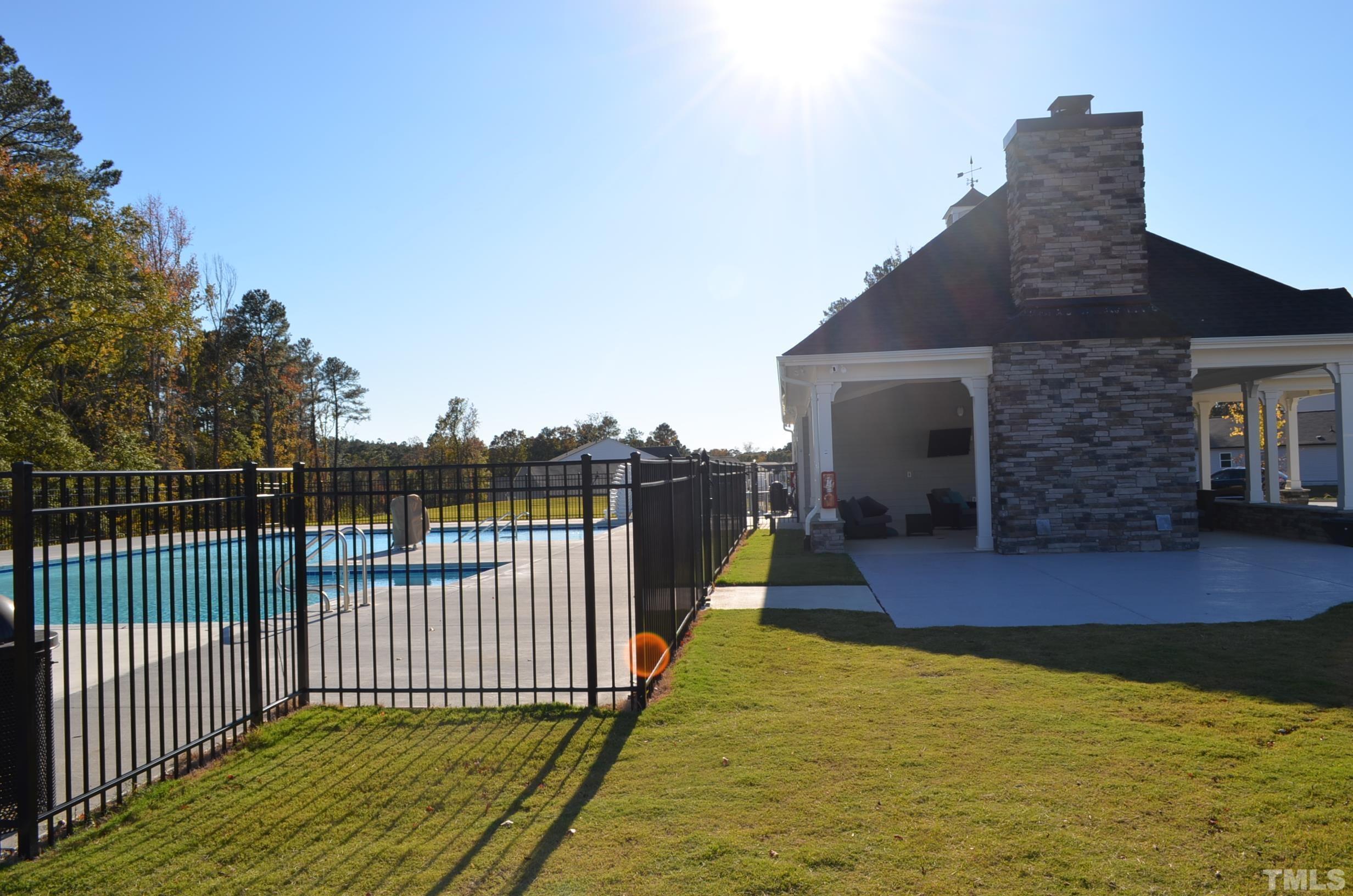 3537 Pinnacle Peak Drive Raleigh, NC 27604 - Photo 40 of 41 a view of a balcony with floor to ceiling window and wooden fence