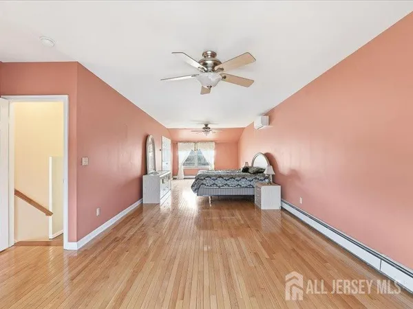 a view of a livingroom with wooden floor