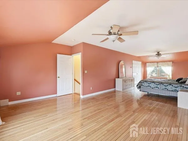 a view of a livingroom with wooden floor