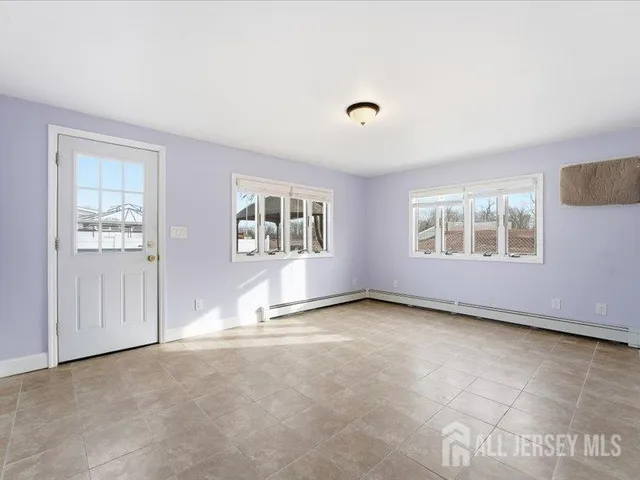 an empty room with windows