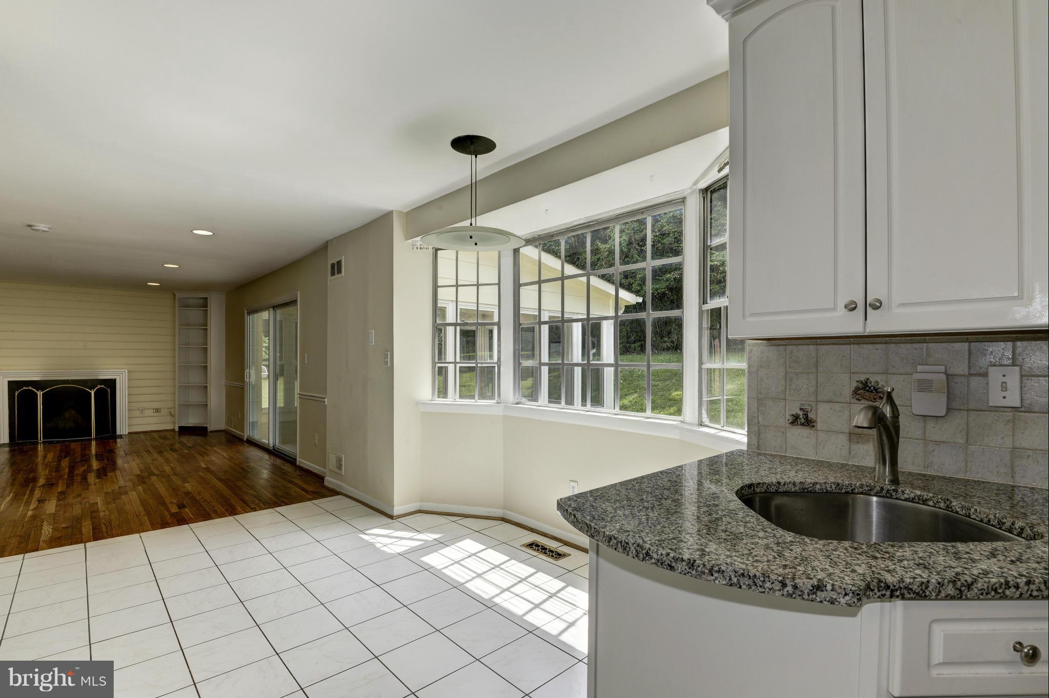 7716 Groton Road Bethesda, MD 20817 - Photo 11 of 30 KITCHEN W/BREAKFAST AREA OPEN TO FAMILY ROOM