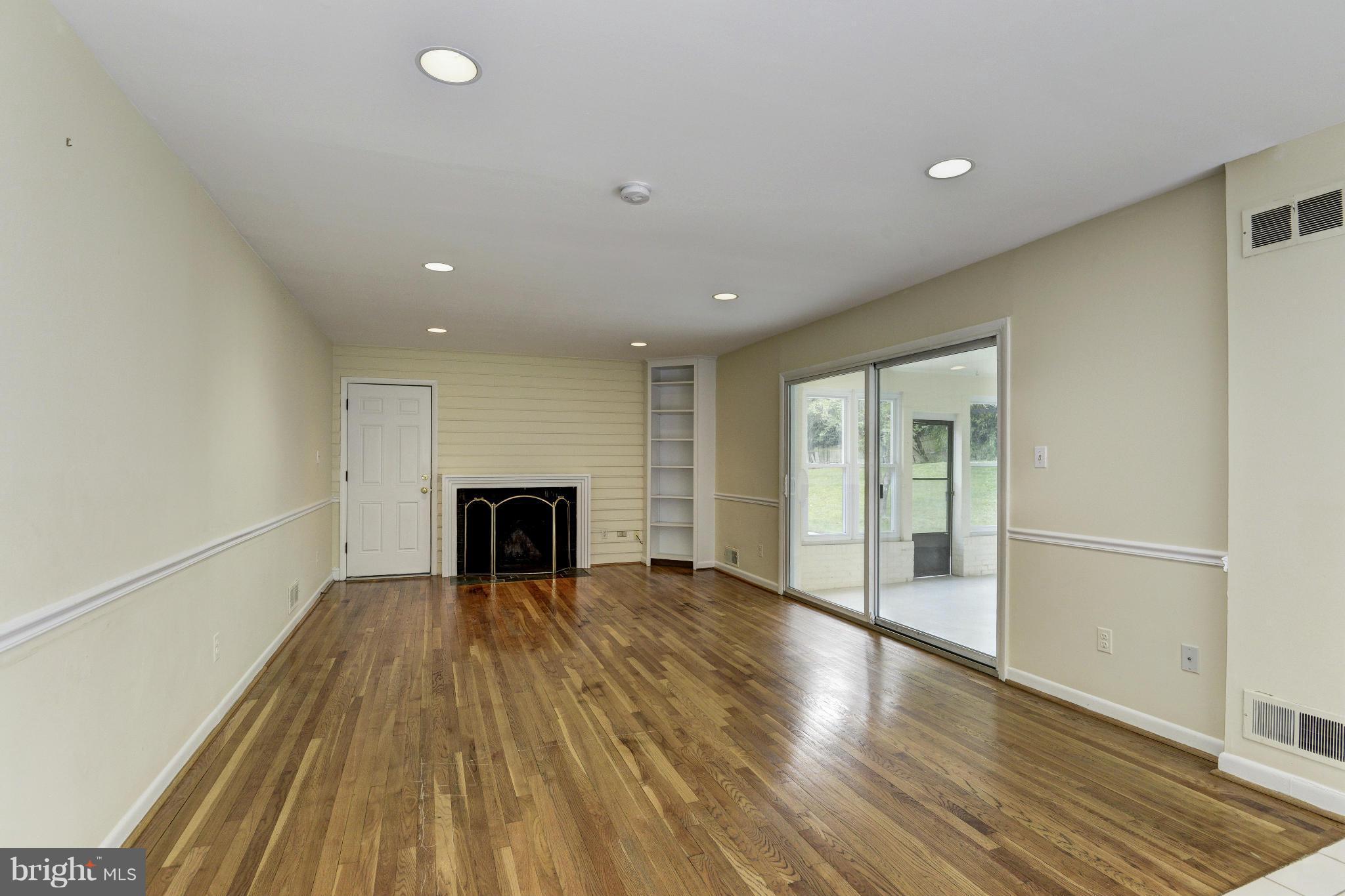 7716 Groton Road Bethesda, MD 20817 - Photo 13 of 30 FAMILY ROOM W/WOD BURNING FP