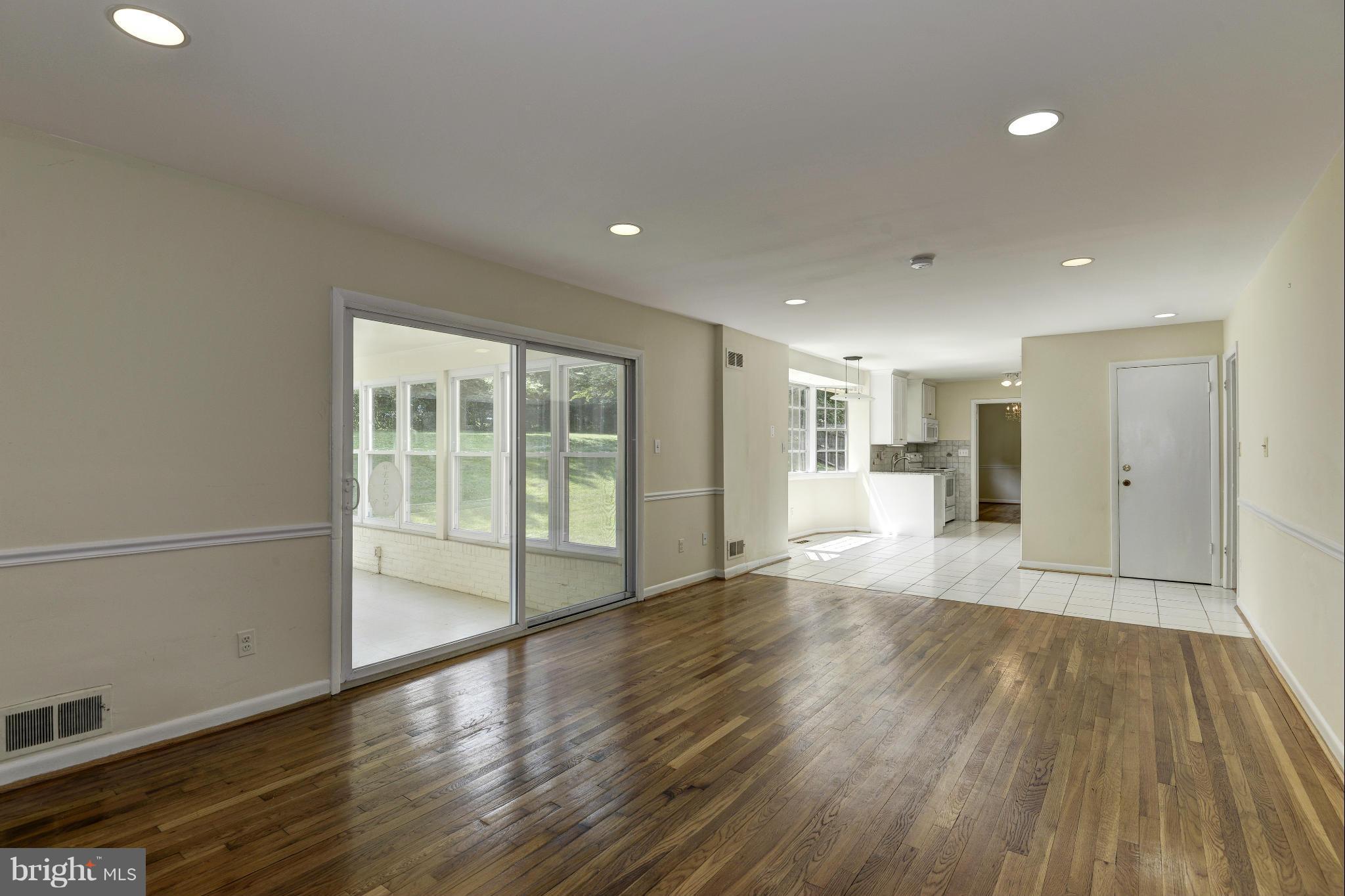 7716 Groton Road Bethesda, MD 20817 - Photo 15 of 30 FAMIL ROOM OPEN TO KIT & SUN ROOM