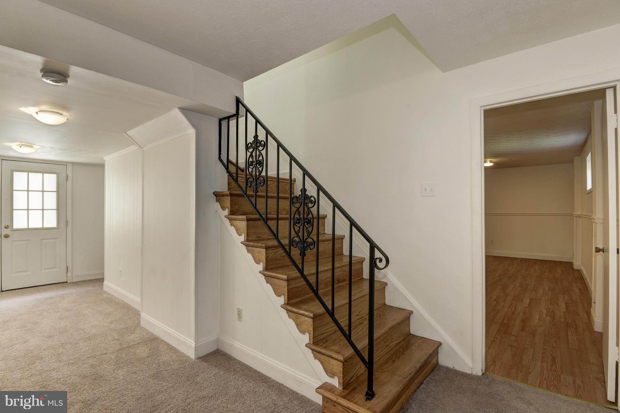 7716 Groton Road Bethesda, MD 20817 - Photo 22 of 30 FINISHED LOWER LEVEL WITH EXIT TO BACK YARD