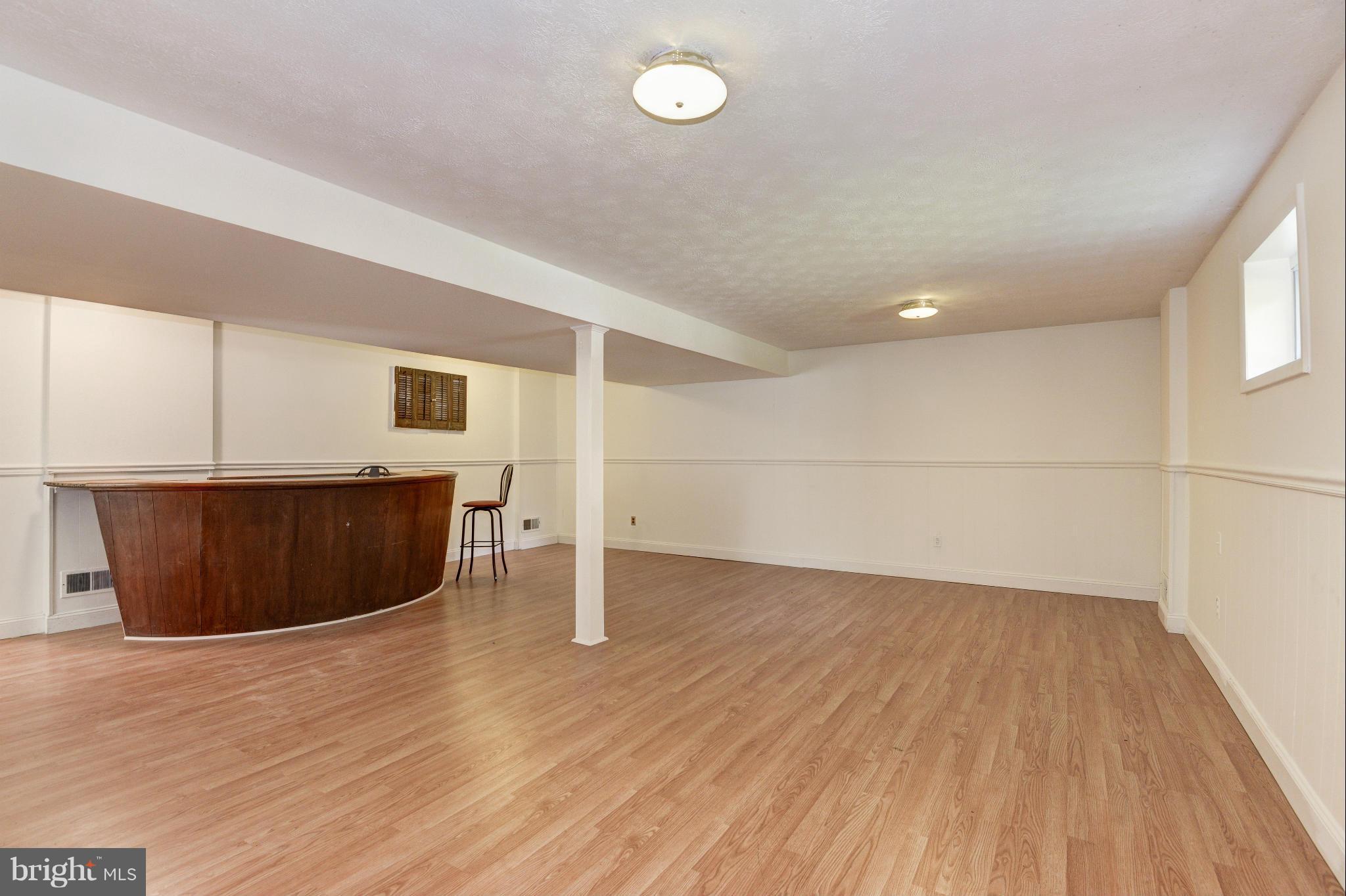 7716 Groton Road Bethesda, MD 20817 - Photo 23 of 30 REC ROOM WITH BAR AREA