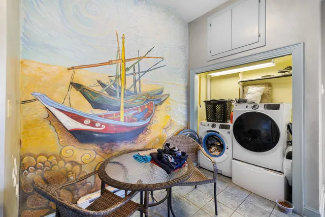 a view of a balcony with wooden floor and city view