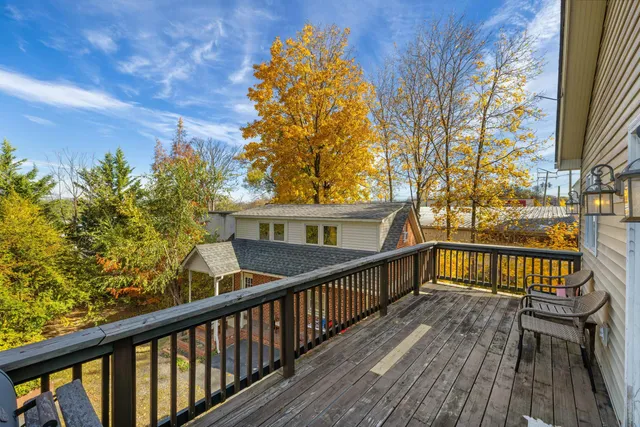 a view of room with window and hardwood floor