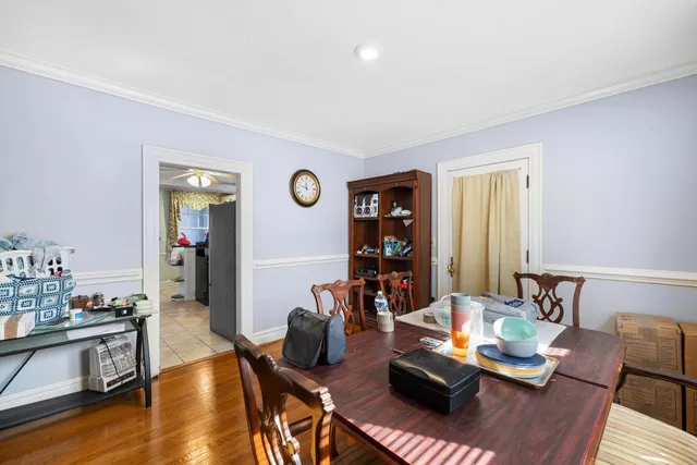 a kitchen with stainless steel appliances a refrigerator sink and cabinets