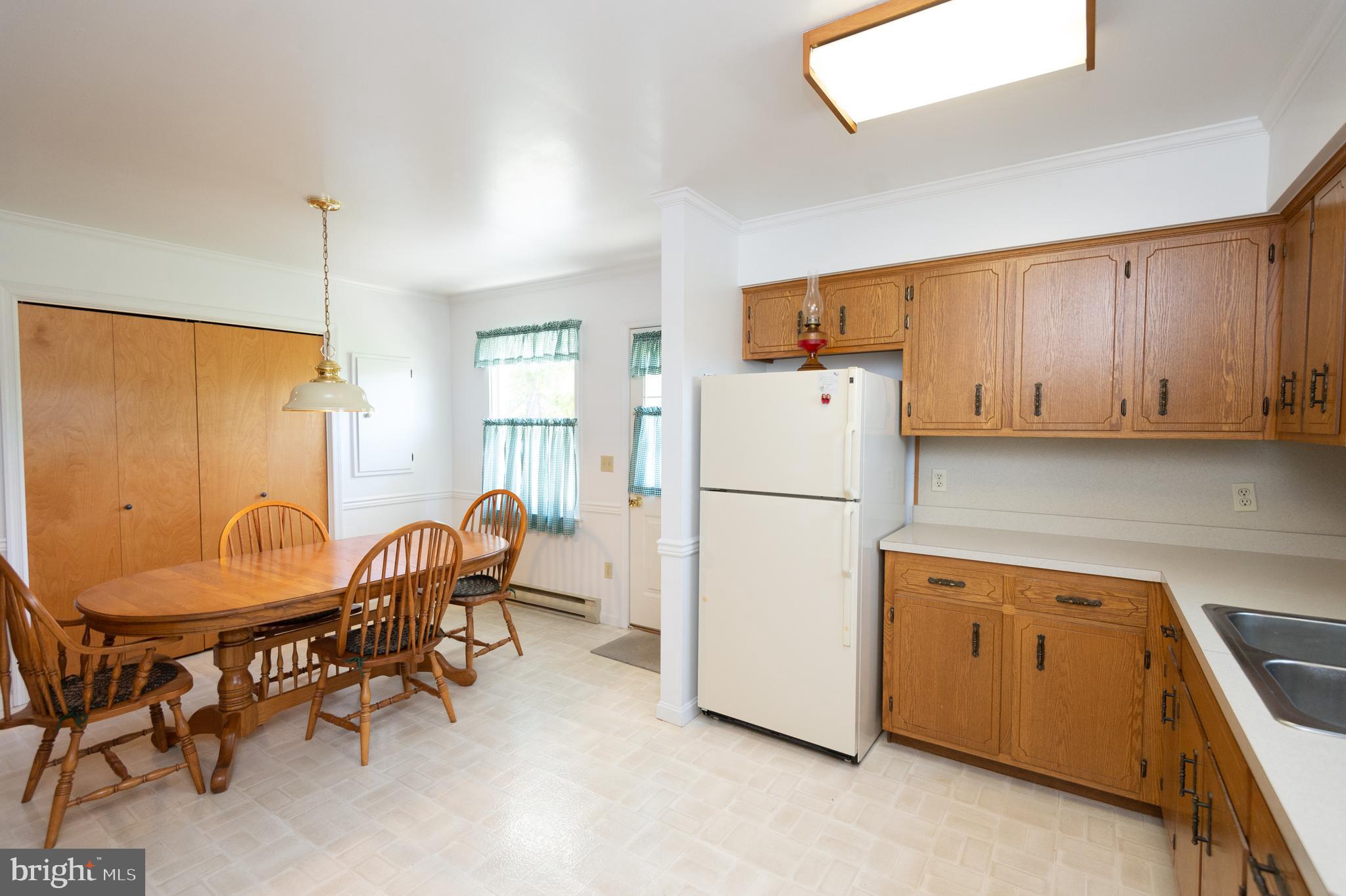 713 Hills Point Road Cambridge, MD 21613 - Photo 7 of 23 kitchen/dining area