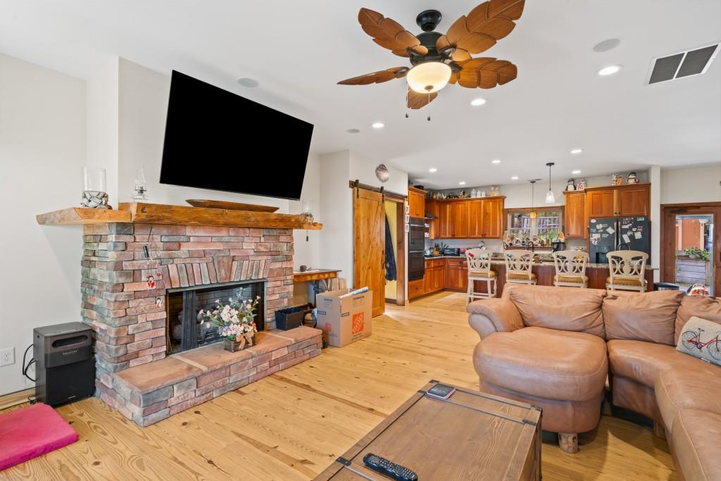 1688 Mulberry Circle Jasper, GA 30143 - Photo 20 of 90 a living room with furniture fireplace and a flat screen tv