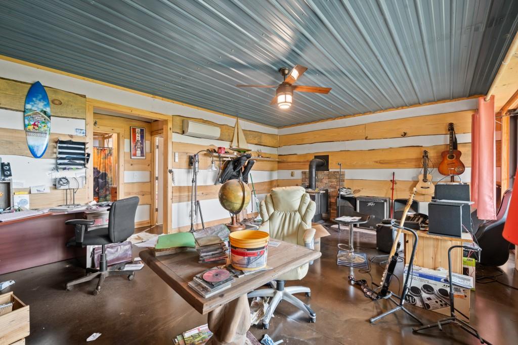 1688 Mulberry Circle Jasper, GA 30143 - Photo 38 of 90 a view of a gym equipment and a table chair in the balcony