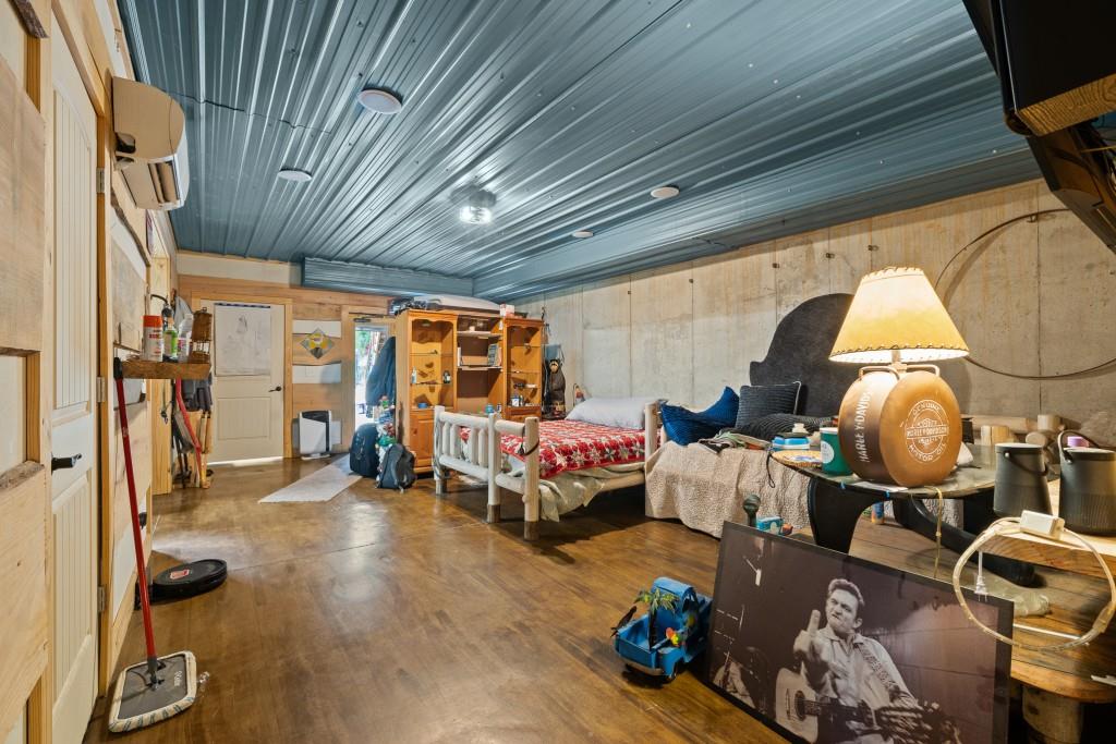 1688 Mulberry Circle Jasper, GA 30143 - Photo 43 of 90 a living room with furniture and a chandelier