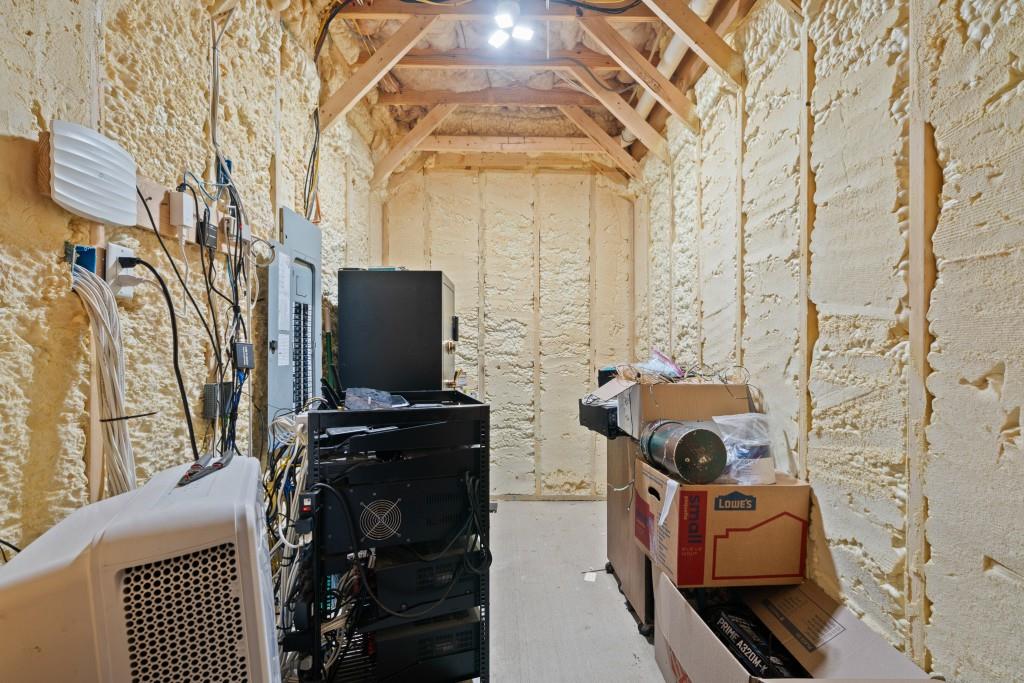 1688 Mulberry Circle Jasper, GA 30143 - Photo 45 of 90 a bedroom with a stove and a flat screen tv