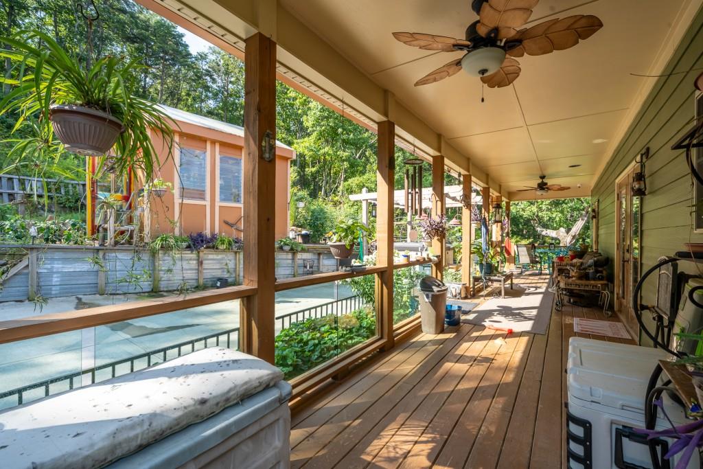 1688 Mulberry Circle Jasper, GA 30143 - Photo 9 of 90 a view of a porch with furniture and a patio