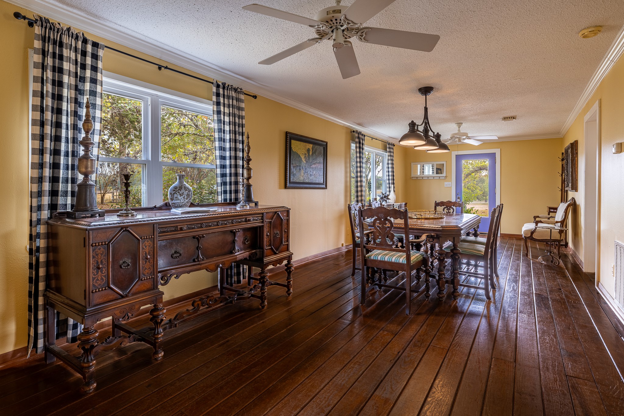 3100 Trails End Lane Brenham, TX 77833 - Photo 15 of 50 a view of a dining room with furniture window and wooden floor