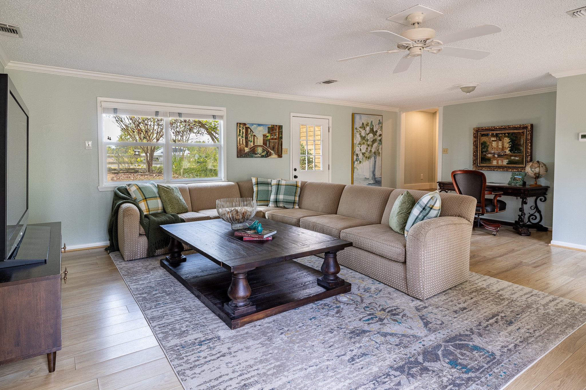 3100 Trails End Lane Brenham, TX 77833 - Photo 19 of 50 a living room with furniture and a flat screen tv
