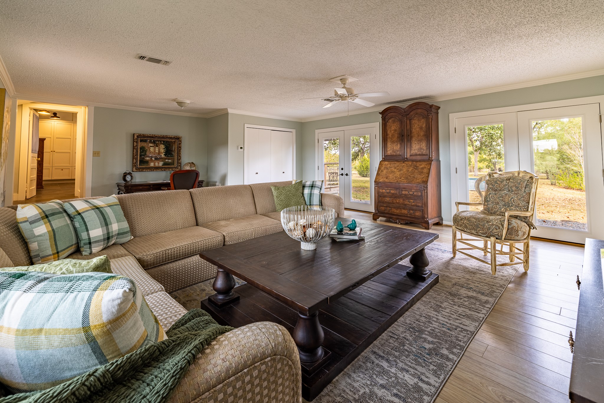 3100 Trails End Lane Brenham, TX 77833 - Photo 20 of 50 a living room with furniture and wooden floor