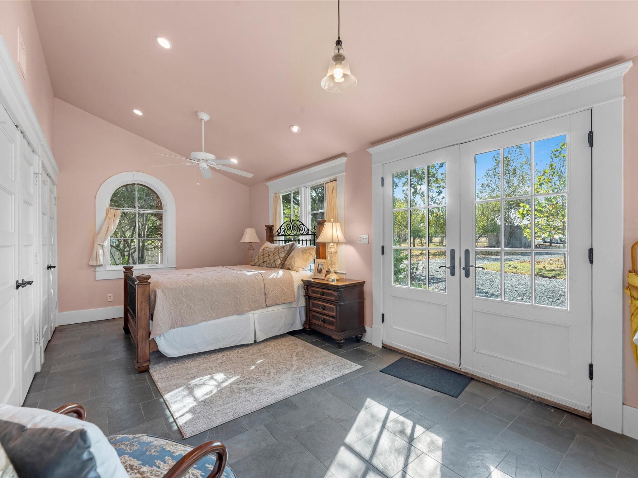 3100 Trails End Lane Brenham, TX 77833 - Photo 27 of 50 a spacious bedroom with a large bed and a window