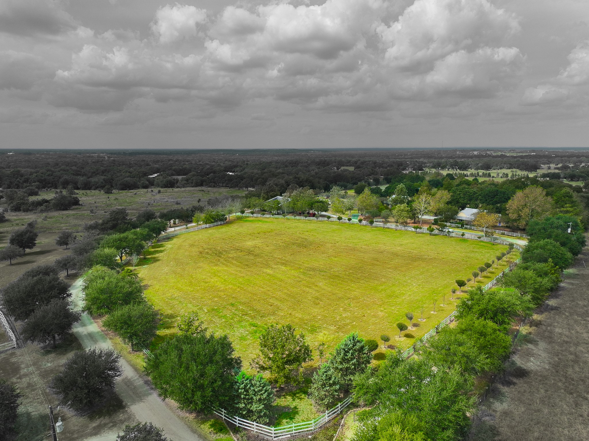 3100 Trails End Lane Brenham, TX 77833 - Photo 48 of 50 a view of an swimming pool and trees in the background