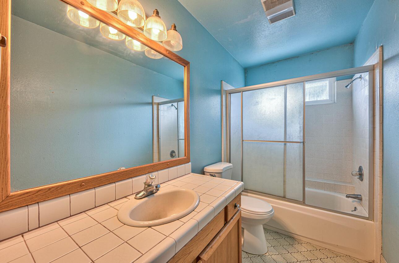 19682 Rogge Road Salinas, CA 93906 - Photo 21 of 22 a bathroom with a sink and a mirror