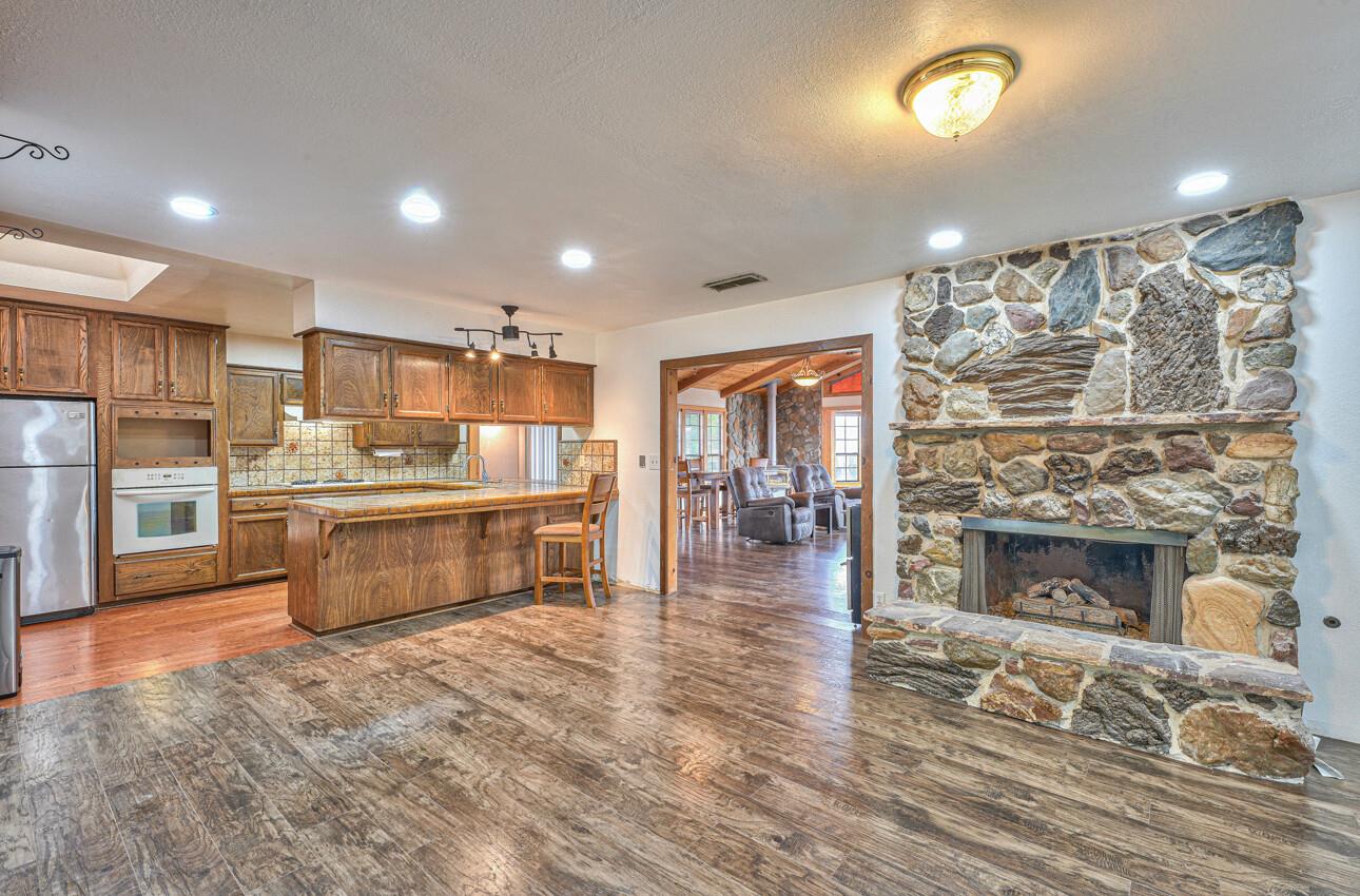 19682 Rogge Road Salinas, CA 93906 - Photo 7 of 22 a large kitchen with cabinets table and chairs
