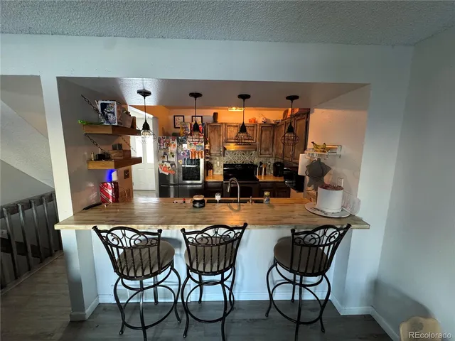 a view of a dining room with furniture