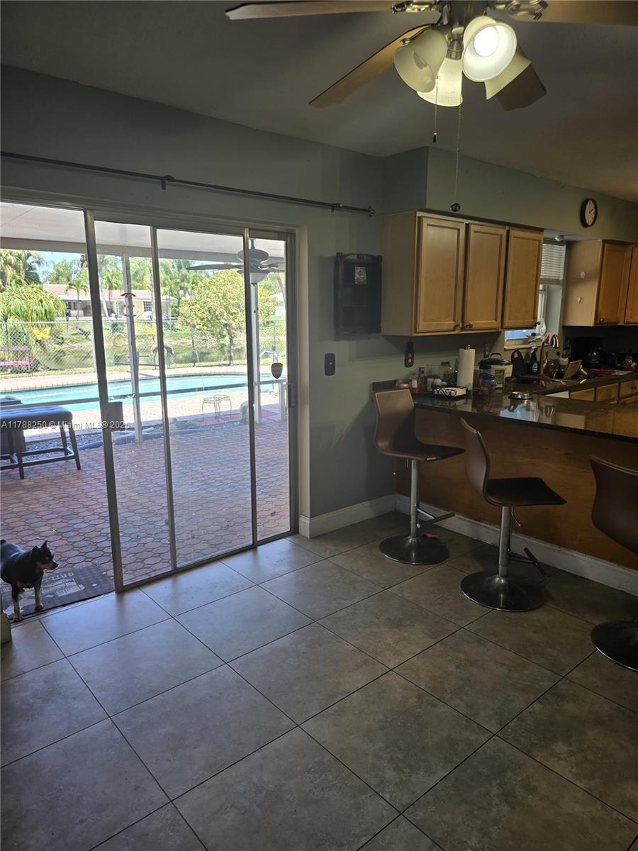 10935 Gable Street Boca Raton, FL 33428 - Photo 13 of 31 a view of a livingroom with furniture and a large window