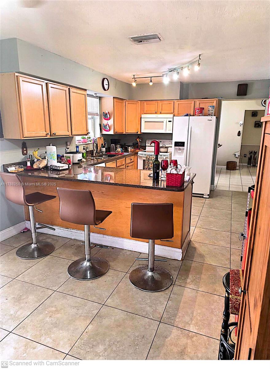 10935 Gable Street Boca Raton, FL 33428 - Photo 14 of 31 a living room with patio furniture