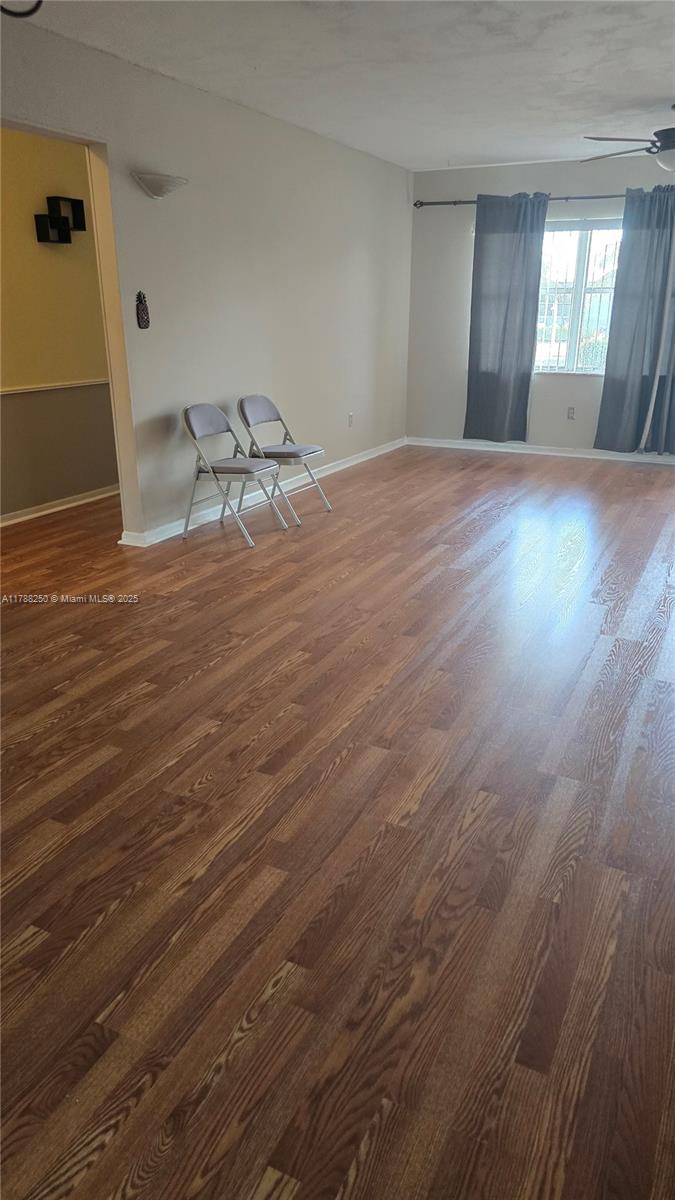 10935 Gable Street Boca Raton, FL 33428 - Photo 19 of 31 a view of empty room with wooden floor
