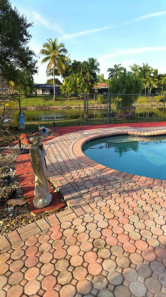 10935 Gable Street Boca Raton, FL 33428 - Photo 22 of 31 a view of a backyard