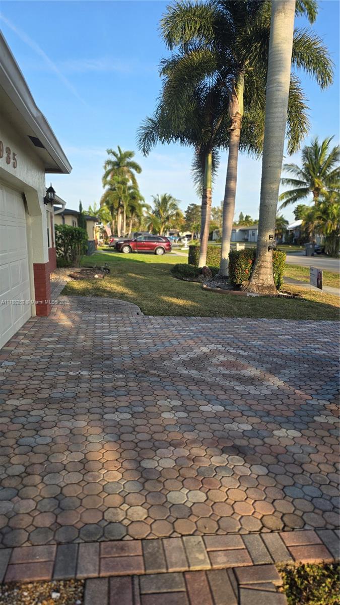 10935 Gable Street Boca Raton, FL 33428 - Photo 30 of 31 a view of a yard