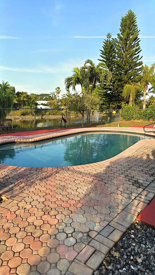 10935 Gable Street Boca Raton, FL 33428 - Photo 8 of 31 a view of a lake with a city view