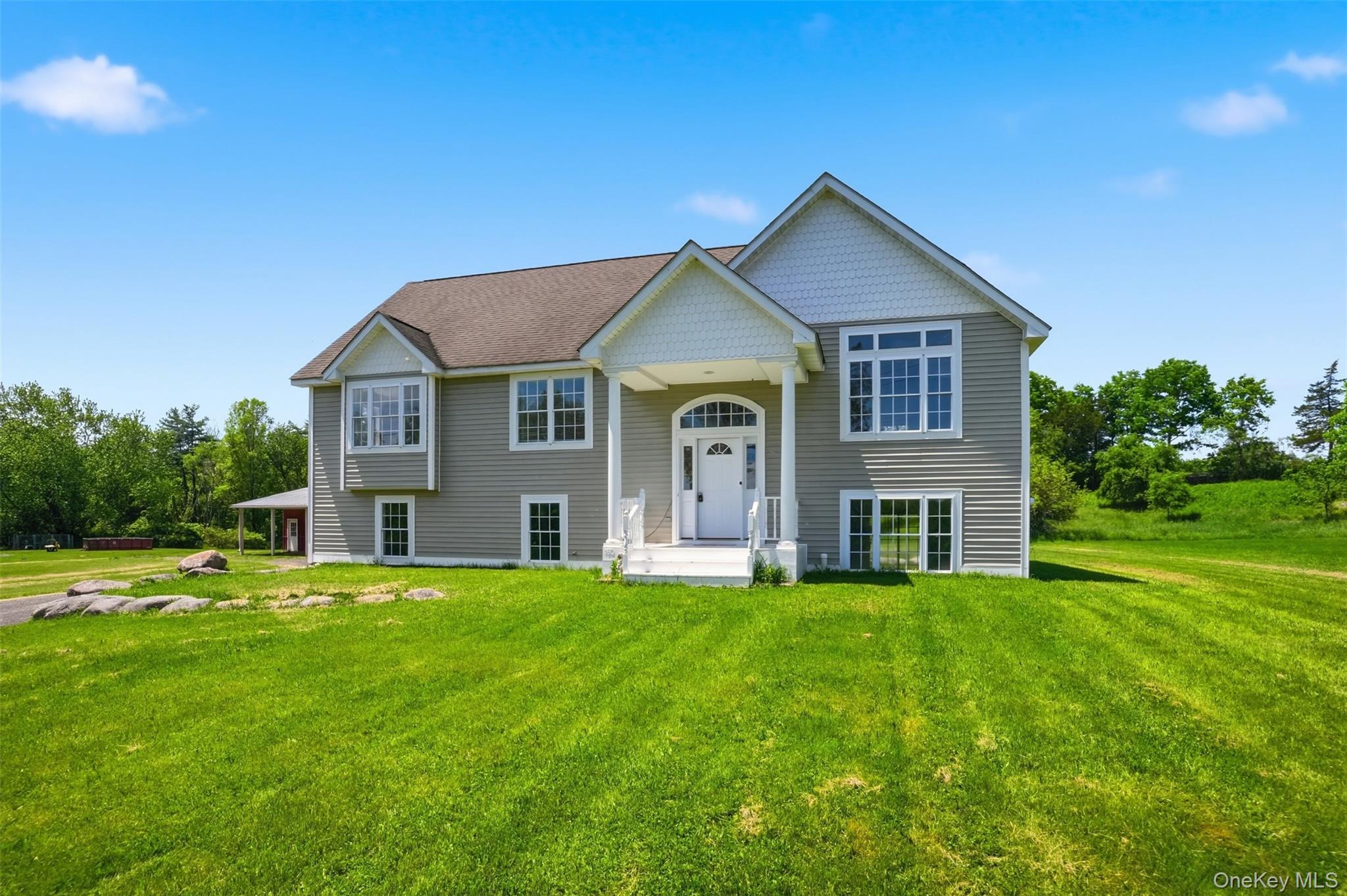 160 Pirog Road Pine Bush, NY 12566 - Photo 3 of 50 a view of a house with a big yard and large trees