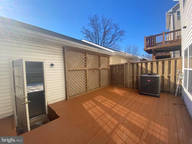a view of a parking space with garage