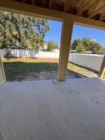 a view of a room with a tree