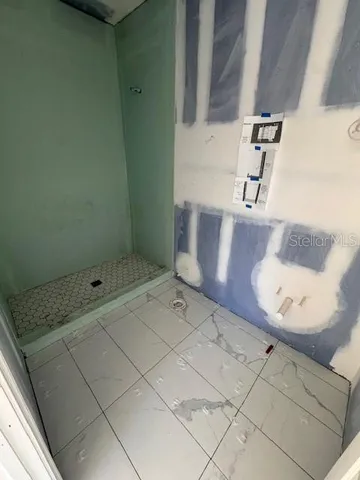 a bathroom with a bathtub and sink