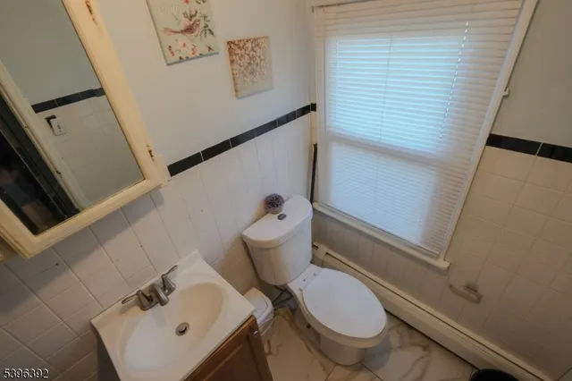 a bathroom with a sink and toilet