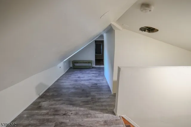 a view of a hallway view with staircase