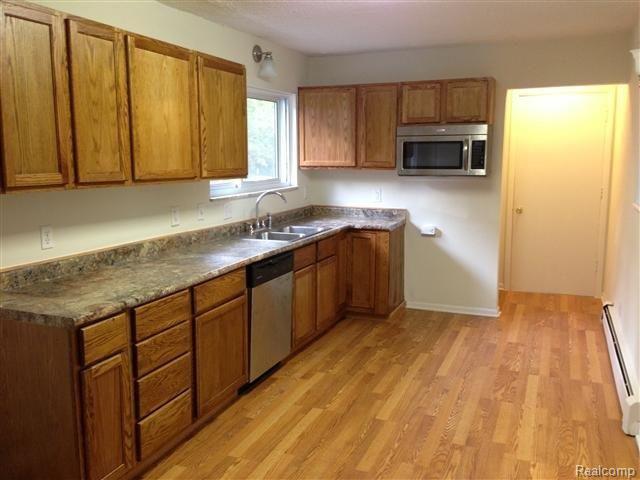 1315 Oakcrest Road Howell, MI 48843 - Photo 7 of 11 Updated kitchen